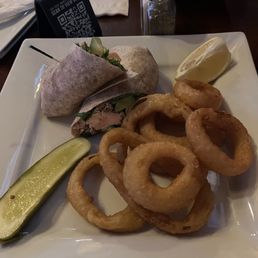 Grilled Atlantic Salmon Wrap with onion rings Grilled Atlantic Salmon Wrap with onion rings