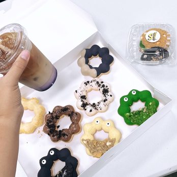 Salamat Cookies - a person holding a cup of coffee - Desserts Near Me Salamat Cookies - a person holding a cup of coffee - Desserts Near Me