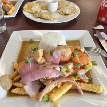 Machu Picchu Peruvian Grill - 2. Pollo Saltado and tostones - Peruvian Near Me - Leon Valley, Texas Machu Picchu Peruvian Grill - 2. Pollo Saltado and tostones - Peruvian Near Me - Leon Valley, Texas