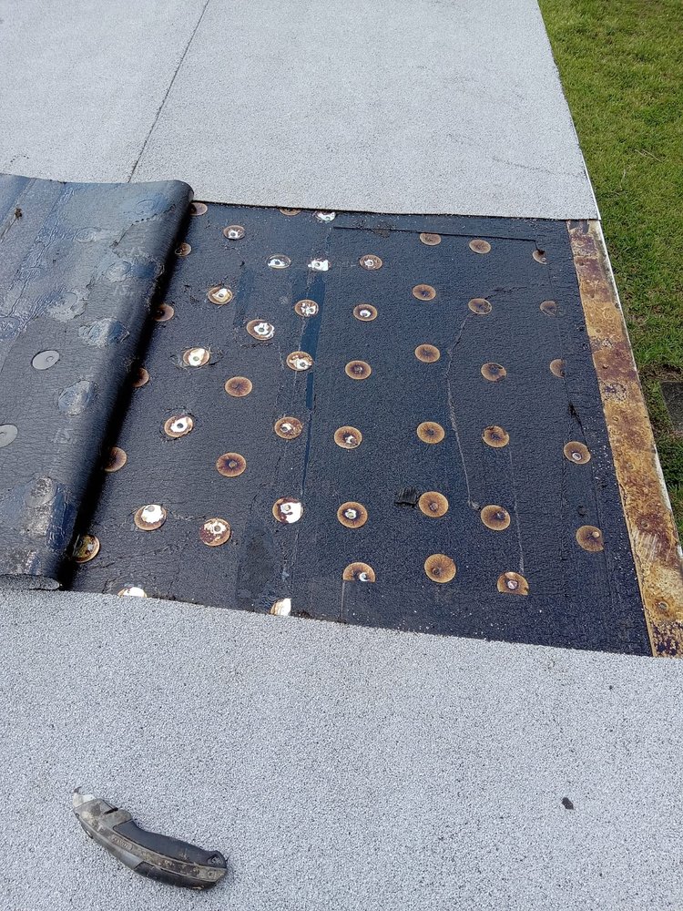 Slide of SGCI Roofing Division