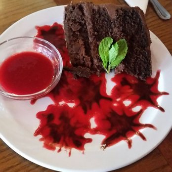 Jordan Street Cafe - Triple chocolate cake with raspberry sauce. Yum! - New American Near Me - Brevard, North Carolina