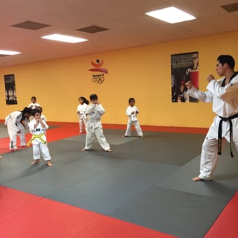 Salim's Taekwondo Center - Mr. Delgadillo teaching the white belts - Taekwondo Near Me - Carson, California Salim's Taekwondo Center - Mr. Delgadillo teaching the white belts - Taekwondo Near Me - Carson, California