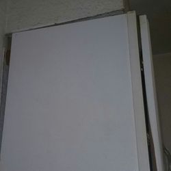 American Inn & Suites - Look that cabinet is about to fall off