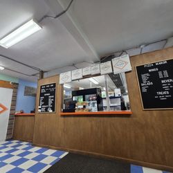 Inside the Pizza Manor Pizza shop.