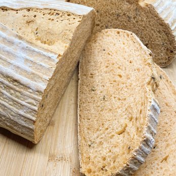 Nature’s Start Bread - sliced bread on a cutting board - Bakeries Near Me - Colorado Springs, Colorado Nature’s Start Bread - sliced bread on a cutting board - Bakeries Near Me - Colorado Springs, Colorado