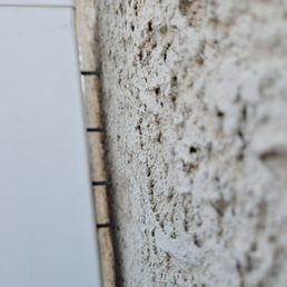 Post screws not attached to the wall and very wobbly.