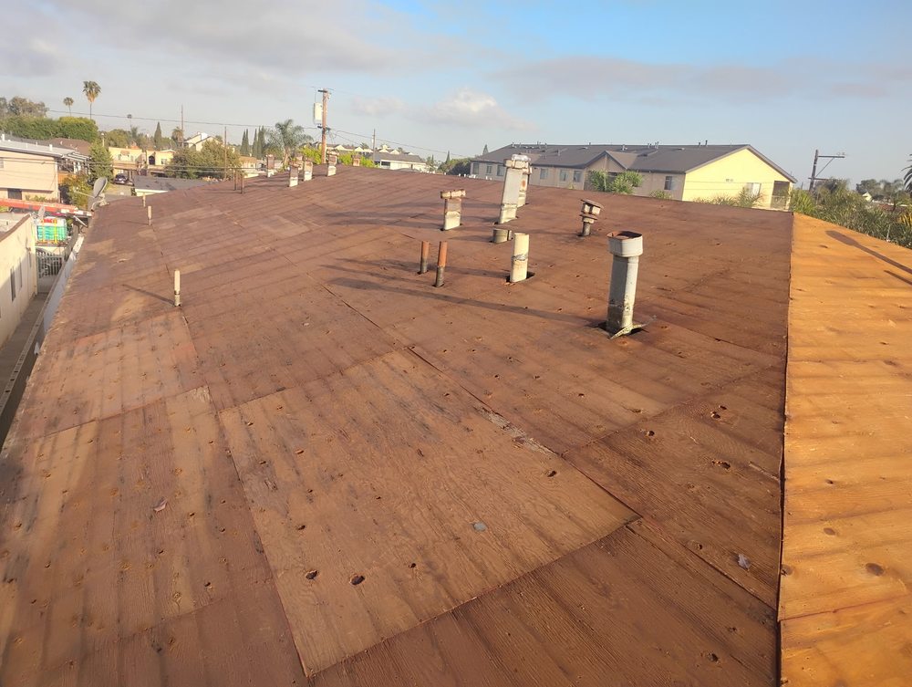 Slide of Sam's Roofing Co