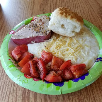 Oh Biscuit - This is the "Tuna and Grits" platter. Notice I ordered a biscuit with it. I can't get away from those amazing biscuits. - Breakfast & Brunch Near Me - Melbourne, Florida Oh Biscuit - This is the "Tuna and Grits" platter. Notice I ordered a biscuit with it. I can't get away from those amazing biscuits. - Breakfast & Brunch Near Me - Melbourne, Florida