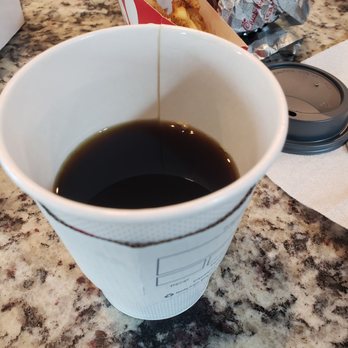 Chick-fil-A - ows a cup of coffee on a counter - Chicken Shop Near Me - Alvin, Texas