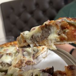 Paradise Pizza and Family Restaurant - Pizza slice
