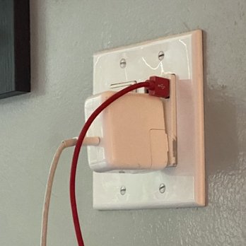 Hotel Royal - Nifty outlet right next to the bed and sink. - Hotels Near Me - Long Beach, California