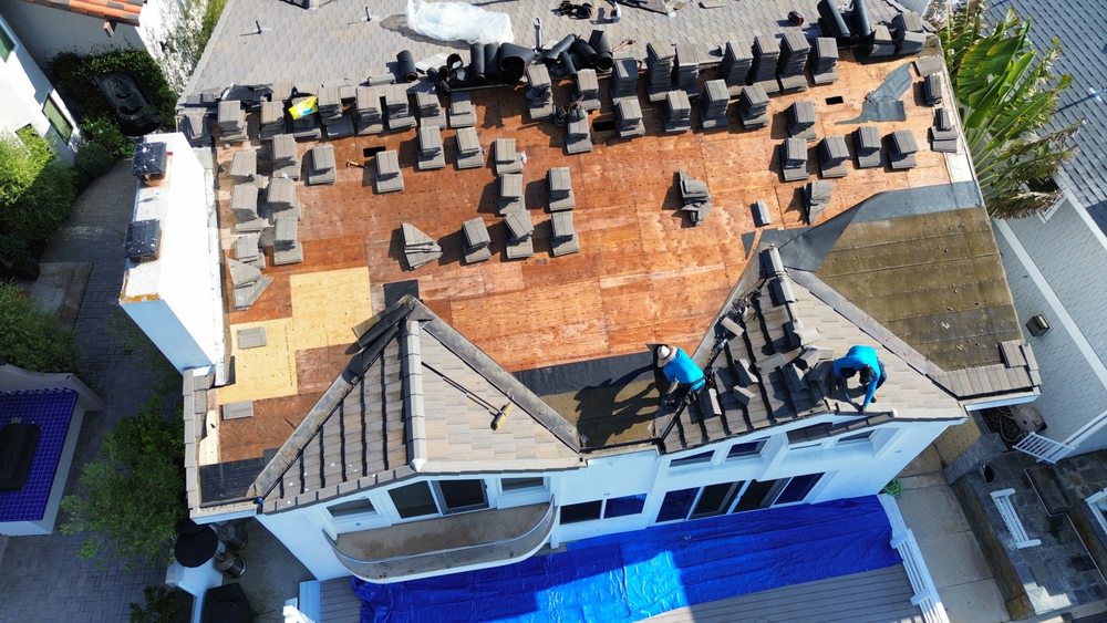 Slide of iHeart Roofing