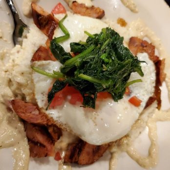 Fat City Kitchen - New Orleans bowl.  Creamy grits, smoky cheese, 2 eggs cooked medium, andouile sausage, some sort of spicy cream, tomatoes and spinach. - American Near Me - Alexandria, Virginia