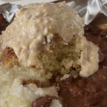 Lucile's Creole Cafe - Biscuits, sausage gravy with grits and red beans - Cajun/Creole Near Me - Longmont, Colorado Lucile's Creole Cafe - Biscuits, sausage gravy with grits and red beans - Cajun/Creole Near Me - Longmont, Colorado