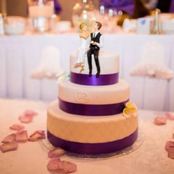 Boadens Banquet Center - Wedding cake with our cute topper added
