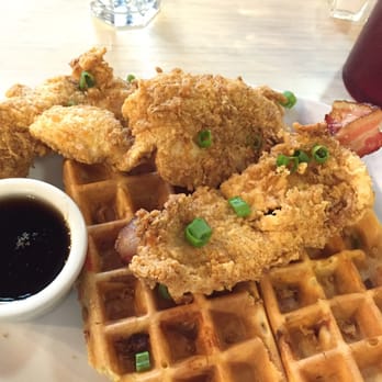 Chicago Waffles - Bacon chicken and waffles. Pretty good! Bacon is in the waffle batter. It comes with spicy syrup but I opted for regular. - Breakfast & Brunch Near Me - Chicago, Illinois