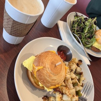 Xulo Coffee Bar - Croissant bacon egg sandwich w/ potatoes - Coffee & Tea Near Me - Elk Grove, California Xulo Coffee Bar - Croissant bacon egg sandwich w/ potatoes - Coffee & Tea Near Me - Elk Grove, California