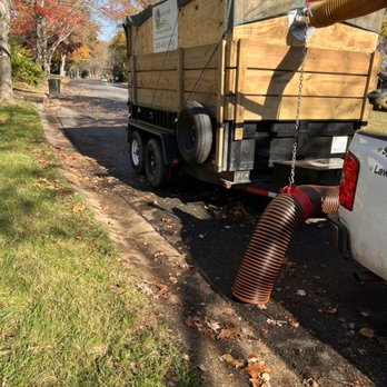 Lawn Star Landscaping Solution - a truck with a hose attached to the back of it - Lawn Services Near Me Lawn Star Landscaping Solution - a truck with a hose attached to the back of it - Lawn Services Near Me