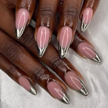 Rock'n Nails - Manicured nails with pink polish and silver metallic tips, shown in a close-up view. - Nail Salons Near Me - Chicago, Illinois