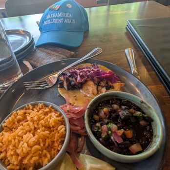 Curious Cantina - Octopus taco with side of black beans & rice - New Mexican Cuisine Near Me - Peachtree City, Georgia Curious Cantina - Octopus taco with side of black beans & rice - New Mexican Cuisine Near Me - Peachtree City, Georgia