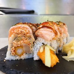 Grobak Sushi - Siered salmon sushi rolls
( chef special)