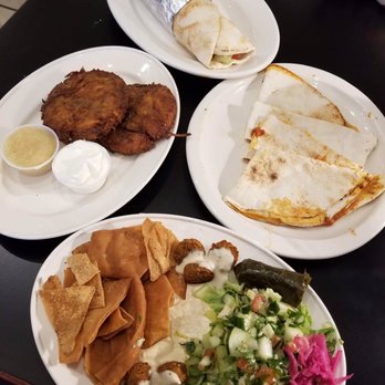 Holyoke Hummus Company - Top: Falafel Sandwich Left Middle: Latkes Right Middle: Kids Pita Pizza Bottom: Falafel Plate - Falafel Near Me Holyoke Hummus Company - Top: Falafel Sandwich Left Middle: Latkes Right Middle: Kids Pita Pizza Bottom: Falafel Plate - Falafel Near Me