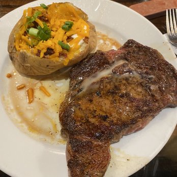 LongHorn Steakhouse - Ribeye w/ loaded baked potato - Steakhouses Near Me - Wilmington, North Carolina LongHorn Steakhouse - Ribeye w/ loaded baked potato - Steakhouses Near Me - Wilmington, North Carolina