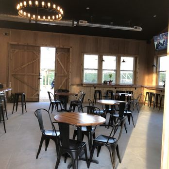 Eavesdrop Brewery - The other side outdoors there is more seating. - Breweries Near Me - Manassas, Virginia