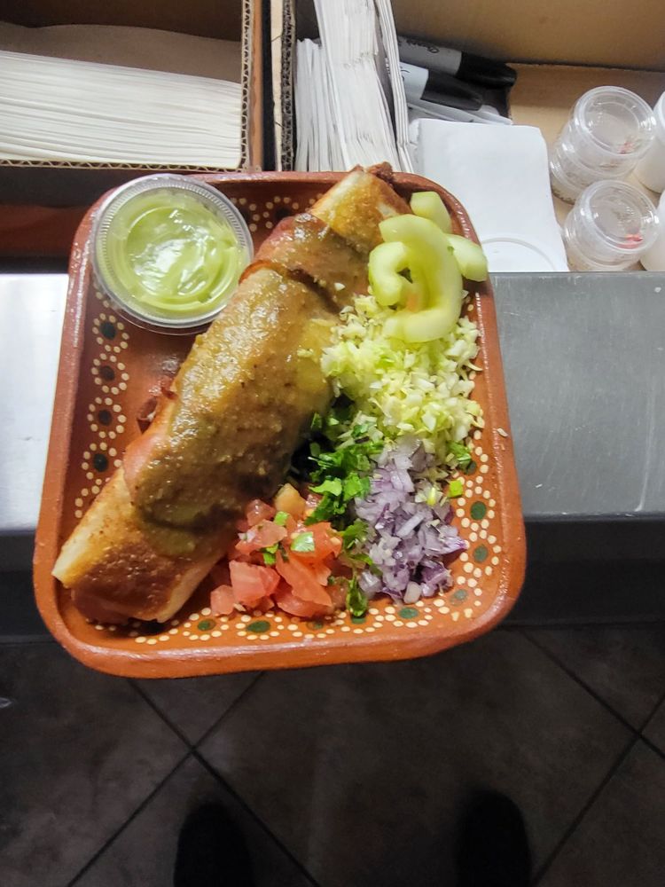 Taqueria Racson Logo