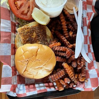 The Beach Club - Grilled fish sandwich with sweet potato fries. - American Near Me - La Pointe, Wisconsin The Beach Club - Grilled fish sandwich with sweet potato fries. - American Near Me - La Pointe, Wisconsin