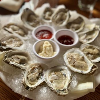 The Cork Tucson - Blue Point freshly shucked oysters with horseradish and house mignonette - Steakhouses Near Me - Tucson, Arizona The Cork Tucson - Blue Point freshly shucked oysters with horseradish and house mignonette - Steakhouses Near Me - Tucson, Arizona