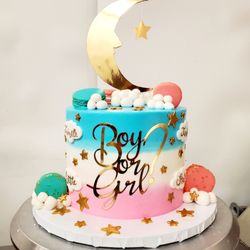 Sweets By Design - Gender reveal cake with mirror topper and font, gold stars and custom french macarons.