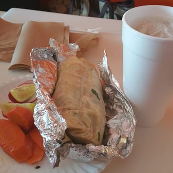Taqueria De Anda - Carne Asada Burrito with a side of Horchata - Mexican Near Me - Fullerton, California Taqueria De Anda - Carne Asada Burrito with a side of Horchata - Mexican Near Me - Fullerton, California