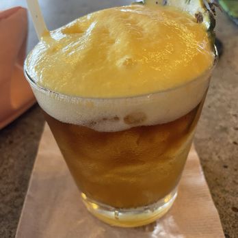 Monkeypod Kitchen - Monkeypod Mai Tai - pretty and tasted delicious but not a lot of rum. Kind of weak. - New American Near Me - Lahaina, Hawaii