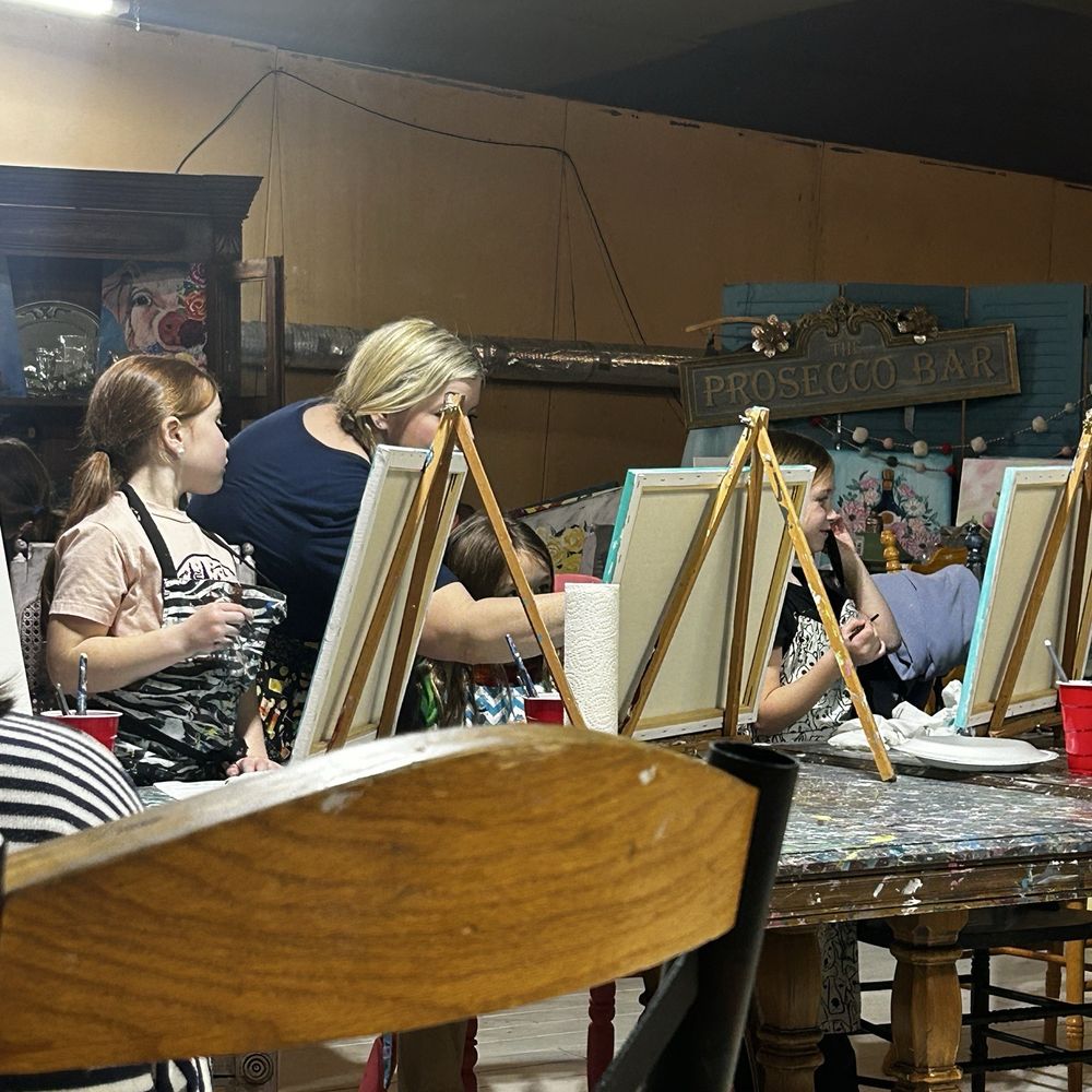 Happy Daisy Art Studio - Jillianne helping the girls - Paint & Sip Near Me - Wilmington, Illinois Happy Daisy Art Studio - Jillianne helping the girls - Paint & Sip Near Me - Wilmington, Illinois