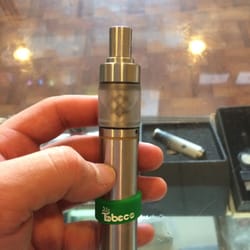 Rocky Mountain Ecigs - 4/9 stainless with orchid v2... Orchid builds just like a plume veil but a bit smaller.. With a 3 ml tank!!!!!
