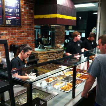 4 Rivers Smokehouse - Going through the lines to get your meat and pick-out your sides - Barbeque Near Me - Gainesville, Florida