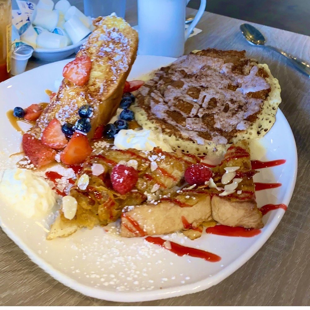 Broken Yolk Cafe - Sweet Trio A sampling of BYC favorites! One slice of Tiki Toast, one slice of Crunchy French Toast and one Cinna-Cake. Sooo Good! - Breakfast & Brunch Near Me - Mesa, Arizona Broken Yolk Cafe - Sweet Trio A sampling of BYC favorites! One slice of Tiki Toast, one slice of Crunchy French Toast and one Cinna-Cake. Sooo Good! - Breakfast & Brunch Near Me - Mesa, Arizona
