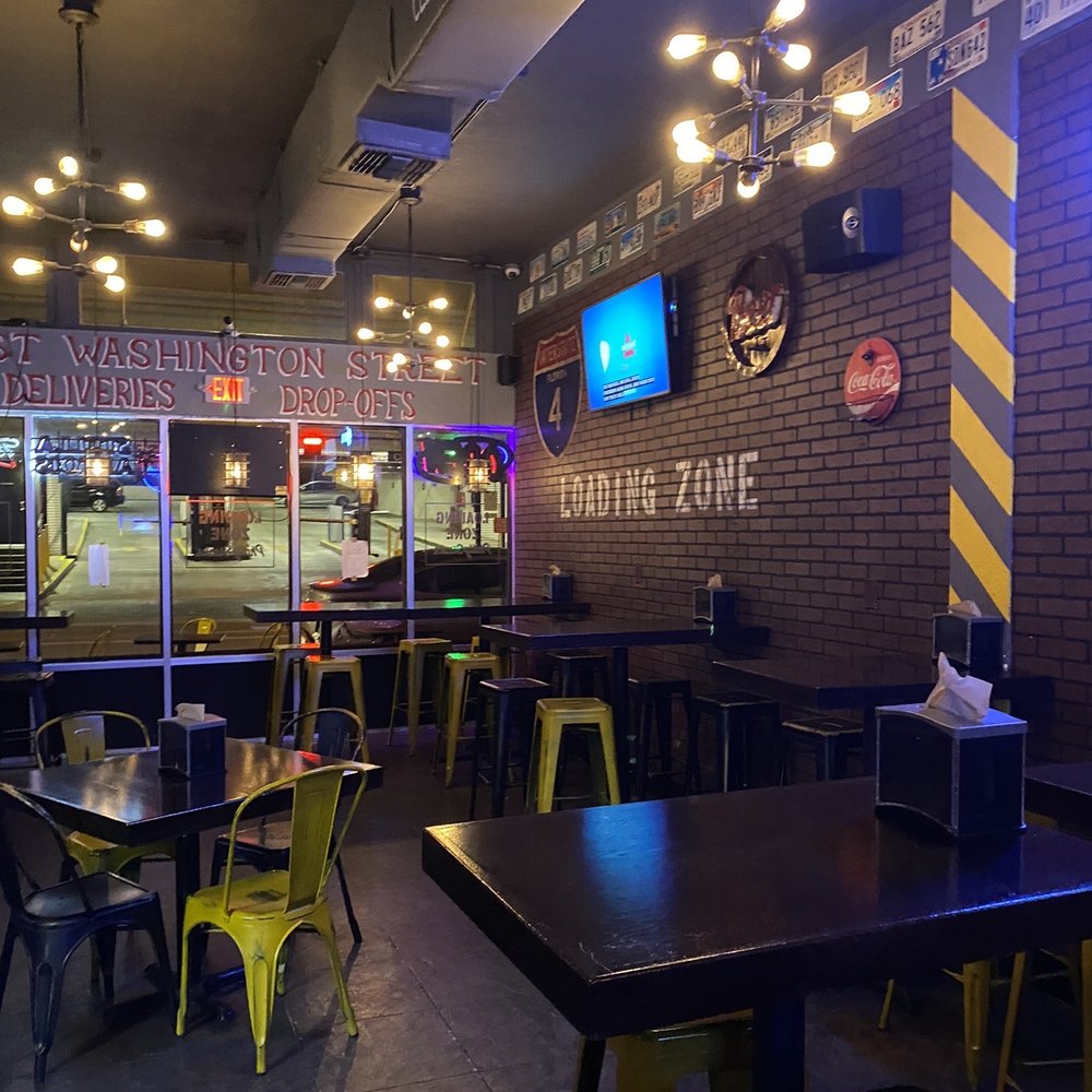 Loading Zone Philly Steaks - tables and chairs - Cheesesteaks Near Me - Orlando, Florida Loading Zone Philly Steaks - tables and chairs - Cheesesteaks Near Me - Orlando, Florida