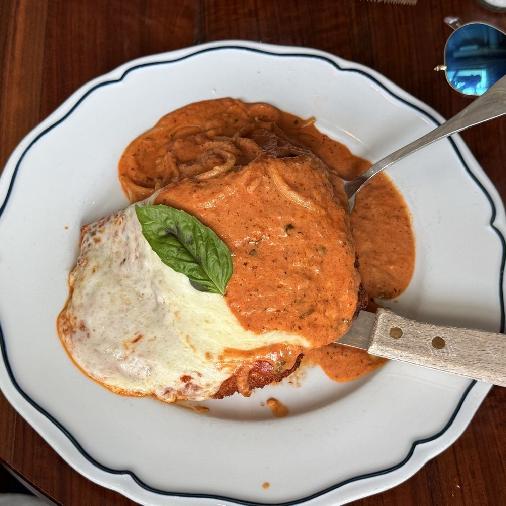 Lynora's - Chicken parmigiana specials order with vodka sauce - Italian Near Me - Palm City, Florida Lynora's - Chicken parmigiana specials order with vodka sauce - Italian Near Me - Palm City, Florida