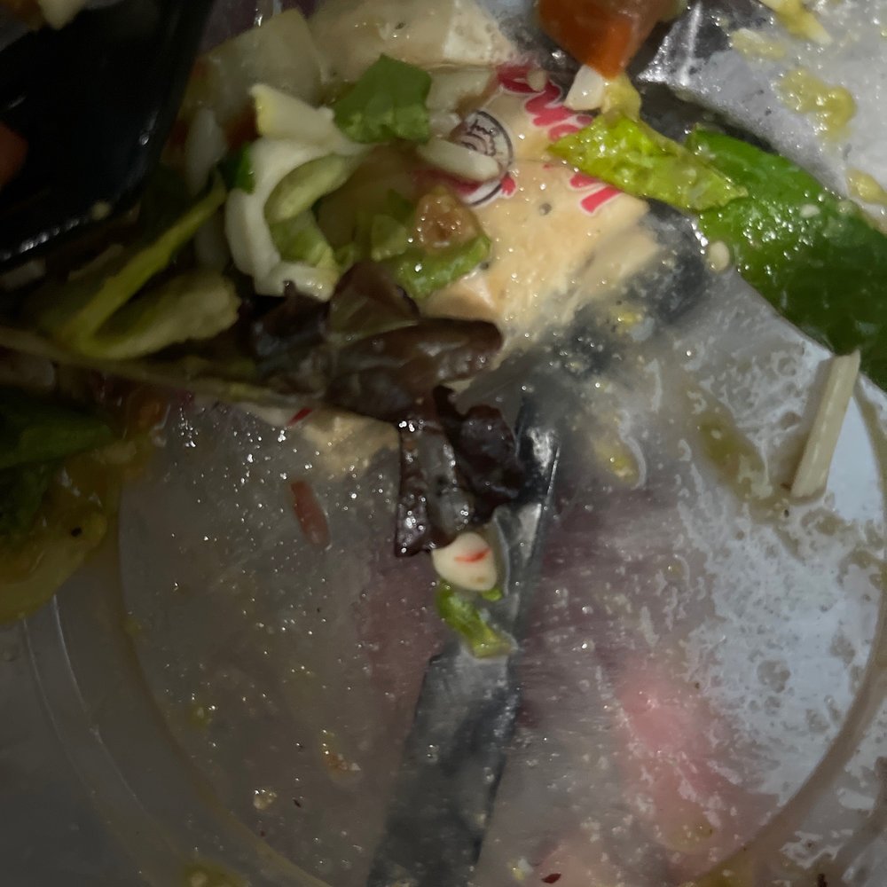 a half eaten plate of food a half eaten plate of food