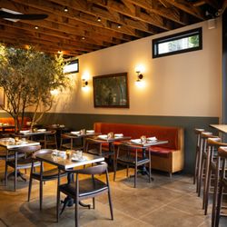 Wife and the Somm - Inside Dining Room with the Olive Tree