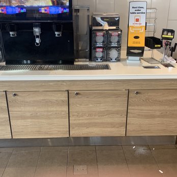 McDonald's - a coffee machine on a counter - Fast Food Near Me - Purcellville, Virginia