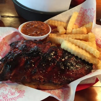 Bubbalou's Bodacious BBQ - Baby back ribs with beans and fries. - Barbeque Near Me - Altamonte Springs, Florida