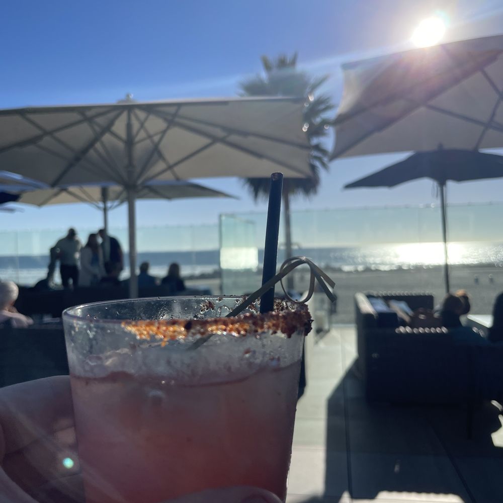 Sun Deck - Smokey Sunburn with a setting sun - American Near Me - Coronado, California Sun Deck - Smokey Sunburn with a setting sun - American Near Me - Coronado, California