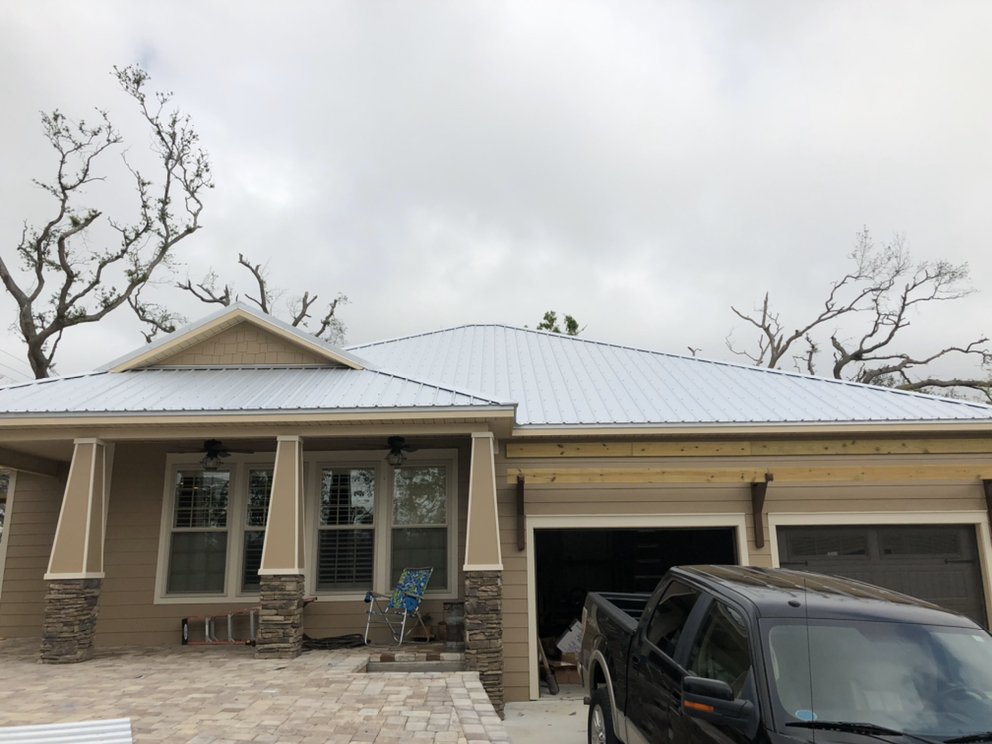 Slide of Old Town Roofing