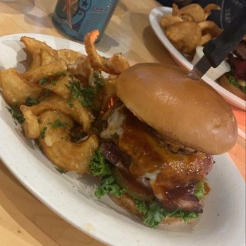 Scooter's Chillin'-N-Grillin' - Bison burger with bacon and garlic fries - Sports Bars Near Me - Twin Falls, Idaho Scooter's Chillin'-N-Grillin' - Bison burger with bacon and garlic fries - Sports Bars Near Me - Twin Falls, Idaho