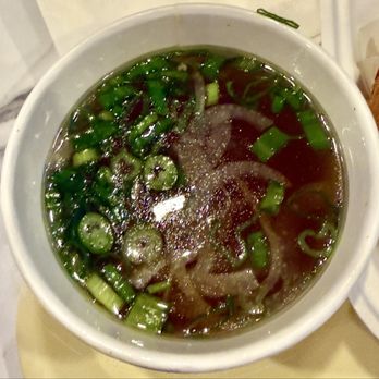 Little Kirin - Pho broth - it is more yellow than it looks in photo - Comfort Food Near Me - New York, New York