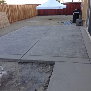 Oceanic Concrete - Stamped patio and walkway runs around the side of the house to the front driveway - Masonry/Concrete Near Me Oceanic Concrete - Stamped patio and walkway runs around the side of the house to the front driveway - Masonry/Concrete Near Me