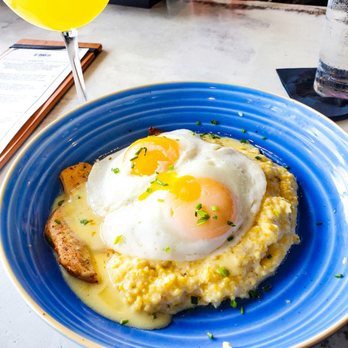 Stirr - Grits and eggs with chicken - New American Near Me - Dallas, Texas Stirr - Grits and eggs with chicken - New American Near Me - Dallas, Texas